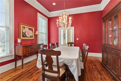 The formal dining room is an elegant space that is