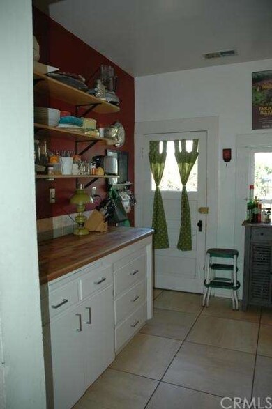 view of kitchen from dining room entry, door goes 
