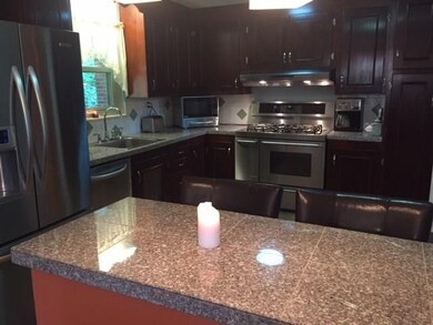 Large kitchen offering S/S appliances, double door