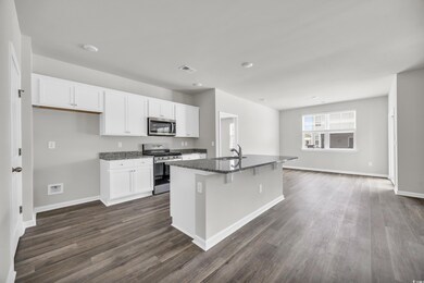 Kitchen with sink, stainless steel appliances, an 
