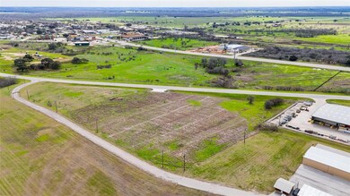 Aerial view of sparsely populated area featuring 