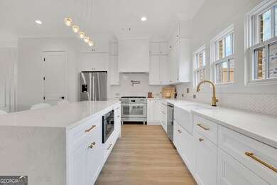 “Photos are of the model home; actual finishes may