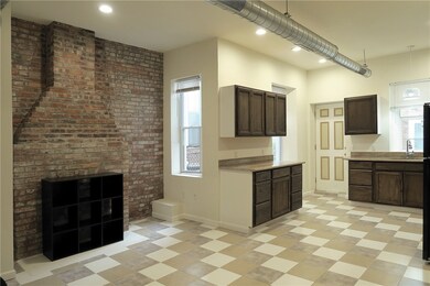 Open Living/Kitchen Area:  LR 11x16, Kitchen 10x11