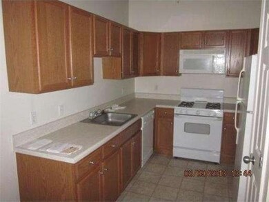 Spicket Commons unit 413, Methuen, MA 01844 - photo 3