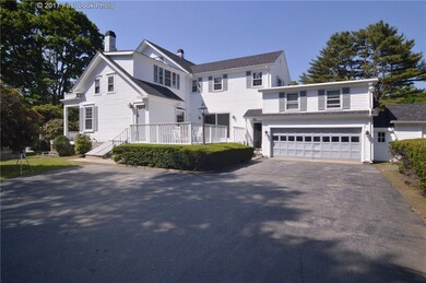 EXTERIOR SIDE WITH ATTACHED GARAGE,WORKSHOP AND BO