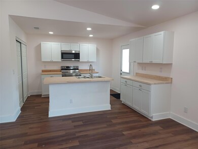 Kitchen featuring appliances with stainless steel