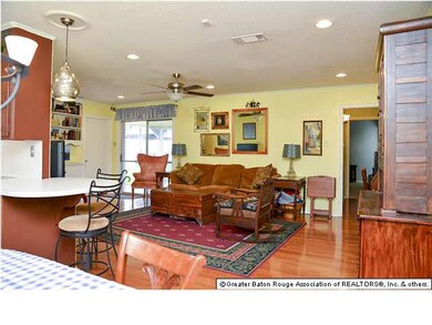 spacious den opens to kitchen/dining area