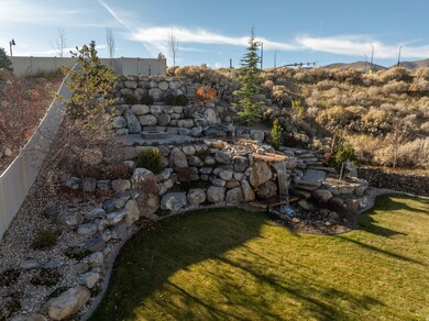 View of yard featuring a garden pond