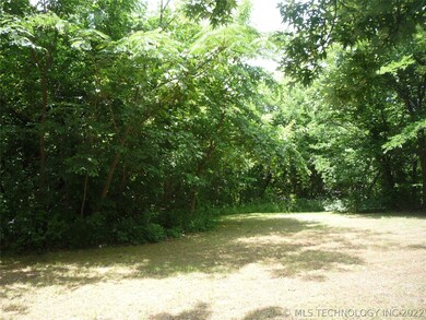 View looking northwest at wooded area
