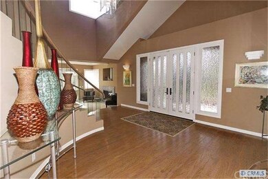 Front Doors And 2 Story Foyer Entry