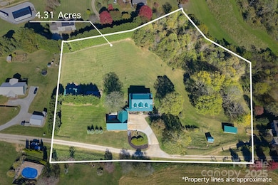 Enjoy breathtaking mountain views from your cabin, surrounded by gentle rolling pastureland that offers total privacy!