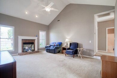 Spacious living room with vaulted ceiling
