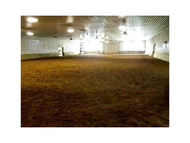 . Full indoor riding arena with overhead doors