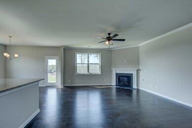 Open plan, lovely great room. Hardwood,wonderful flow make this space one you'll love to spend time in! All photos are representative of a similar home. All photos are representative of a similar home.