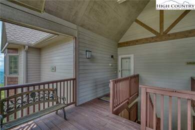 Spacious covered entry area - perfect to shed ski