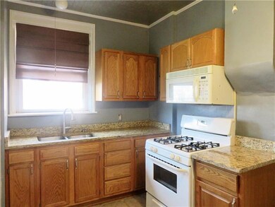Updated kitchen with granite counter tops.
