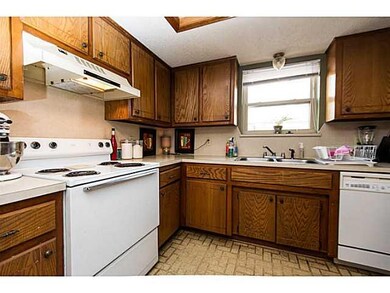 Kitchen. Electric stove, dishwasher and pantry wit