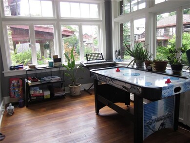 The den/sun room is in the front of the house, and