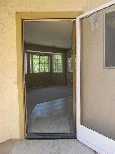 Front screen door entry and deck. 