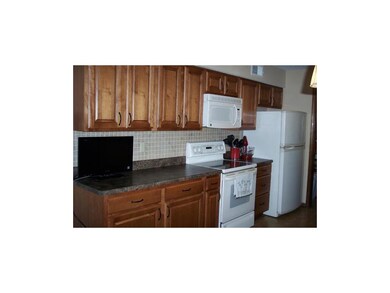 Kitchen has New Custom Cabinets, Countertops, & Ba