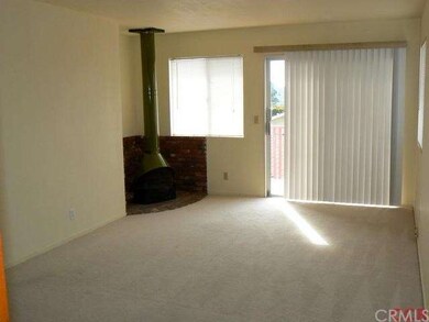 Master bedroom upstairs with a free standing firep