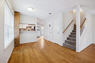 Unfurnished living room with light wood finished 