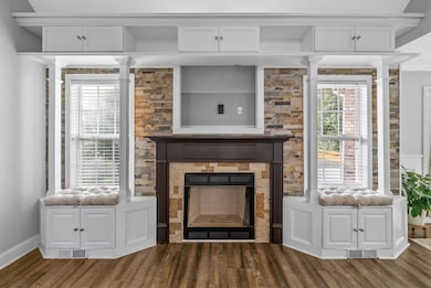 Beautifully designed shelving frame your fireplace.