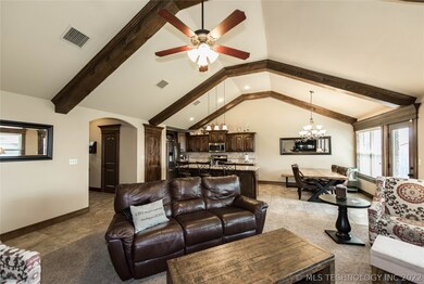 Vaulted Ceiling with Beams in this Large Living Ar