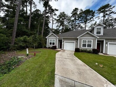 View of front facade featuring a front lawn