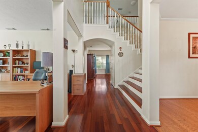 Entry with office space to left, dining to right