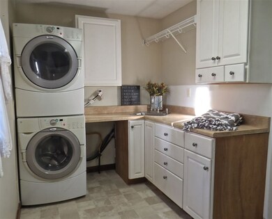 Main level laundry, stackable washer and dryer sta