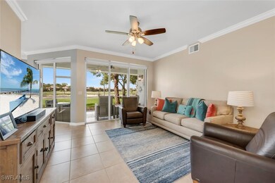 Living area with ceiling fan, ornamental molding,