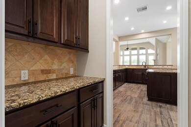 Extra cabinet and countertop area between the kitc
