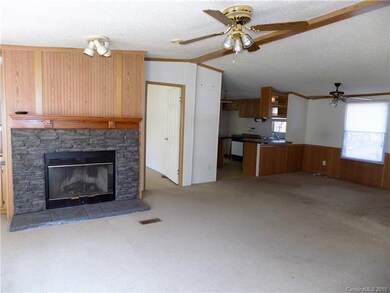 Spacious den with fireplace