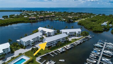 End unit with views of Four Winds Marina and the c