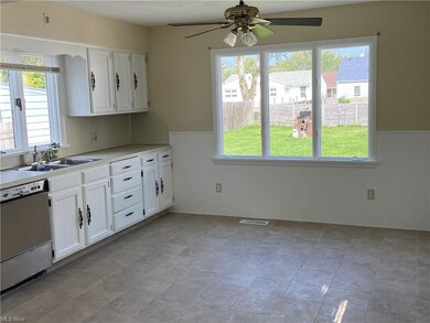 This ceramic floor was JUST installed. Kitchen is 