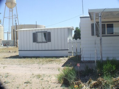 Shop at rear of House