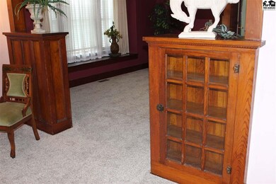 Alternating display cases in the living room and d