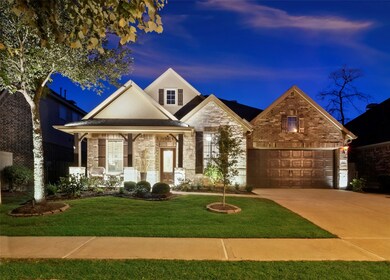 This stunning home has professional landscape lighting!