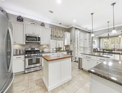 The centerpiece of the home.  The kitchen has ample cabinet space, designer finishes, granite counters and stainless appliances.