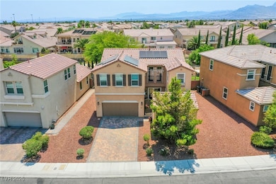 Aerial perspective of suburban area with a mountai