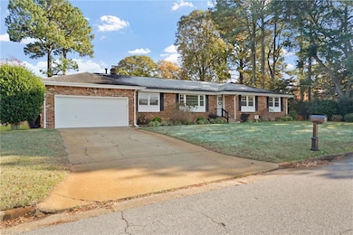 Large 2 car garage and parking for 4 cars in driveway.