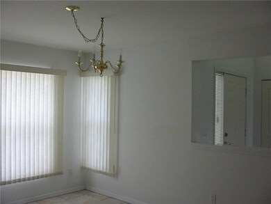 Dining Room. Dining Room - Half Wall - Front Door