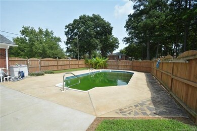 Beautiful and inviting pool, surrounded by privacy fence!  New pool liner coming!