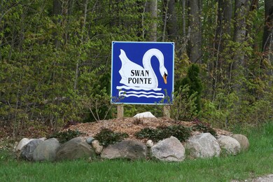 Welcome sign to Swan Pointe