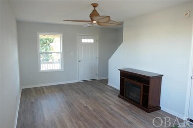 Electric fireplace, leads to covered deck