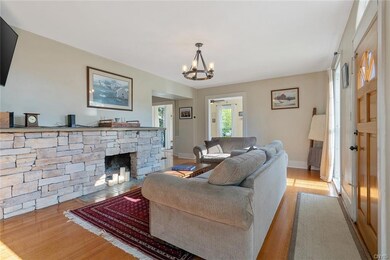 And this eye-catching stone fireplace that extends