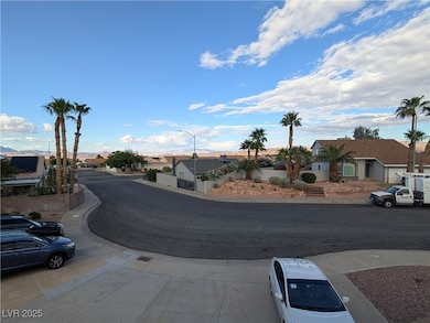 View of road featuring a residential view and street lighting
