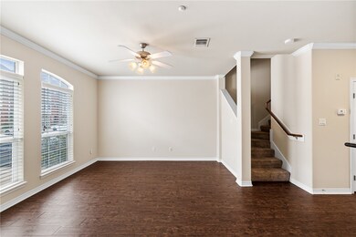 Spare room with dark wood-type flooring, ceiling f