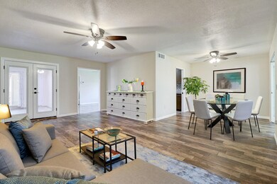 LIVING ROOM LOOKING TOWARD KITCHEN